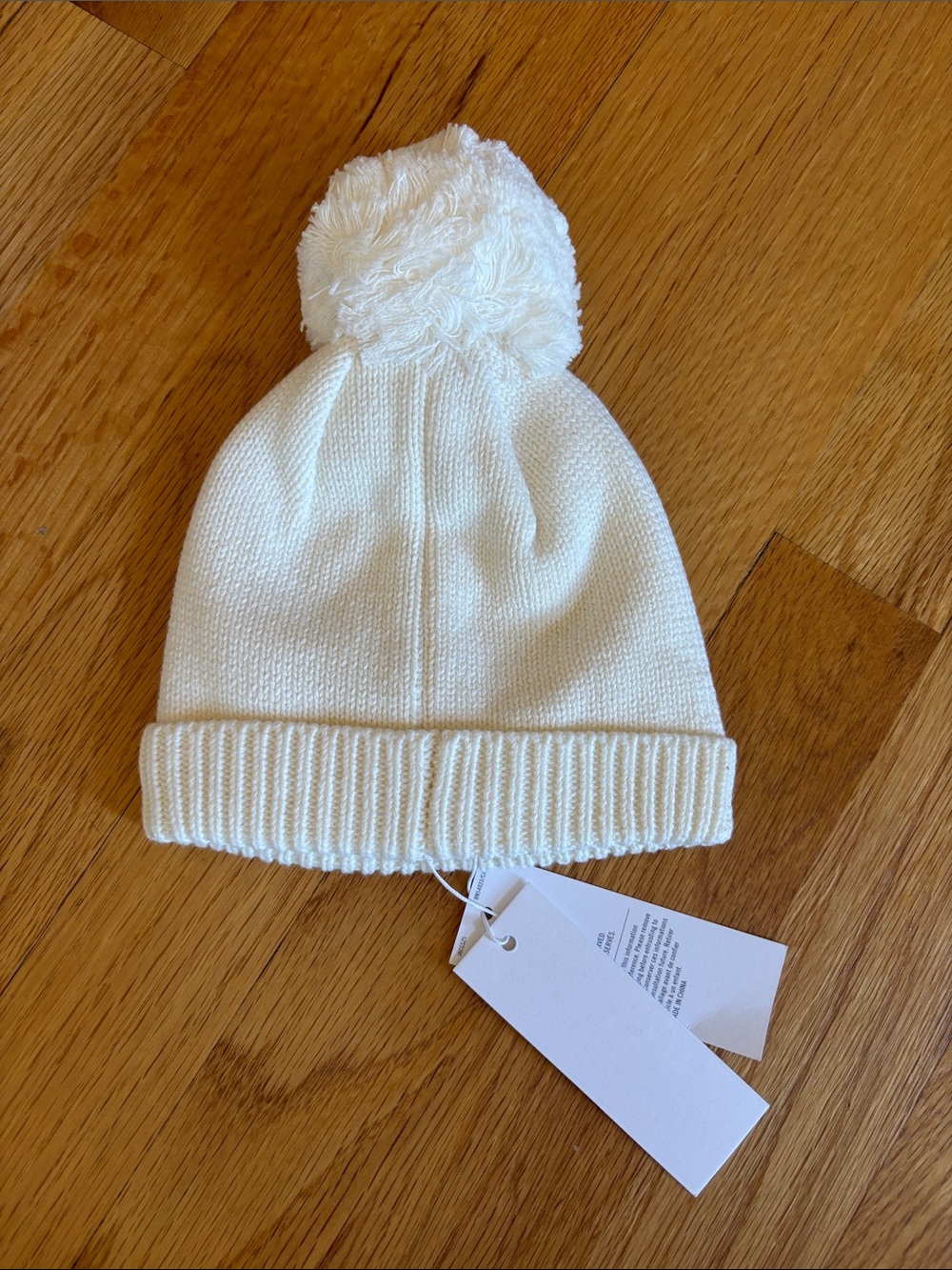 Janie and Jack NB Cream Cable Knit Pom Hat - Picture 2 of 3